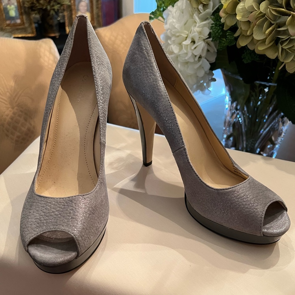 Calvin Klein Grey suede open toe pump.